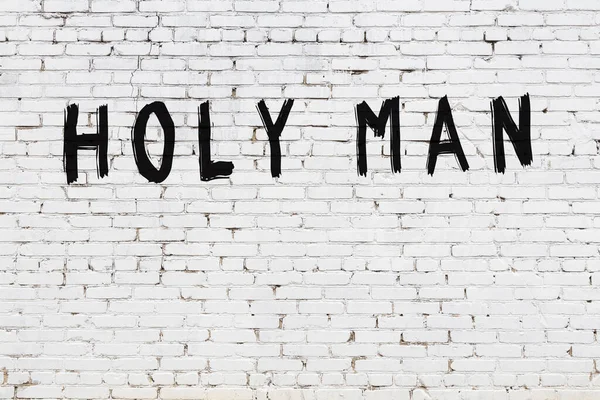 Inscription Holy Man Written Black Paint White Brick Wall — Stock Photo, Image