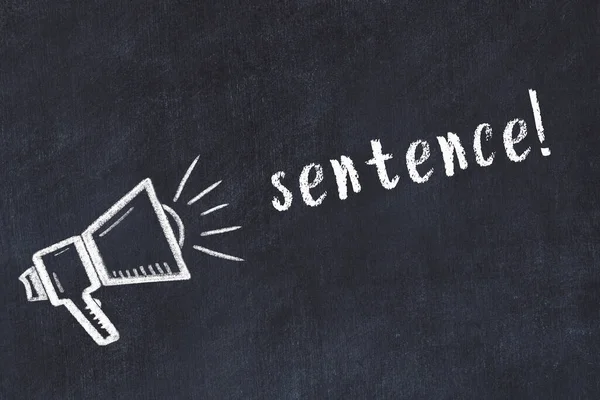 Hoparlörün tebeşir çizimi ve siyah masanın üzerine el yazısıyla yazılmış yazı cümlesi