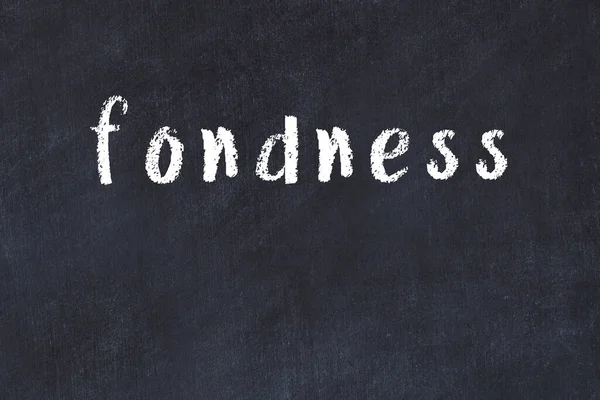 Tebeşir el yazısı yazı düşkünlüğü siyah masa üzerinde