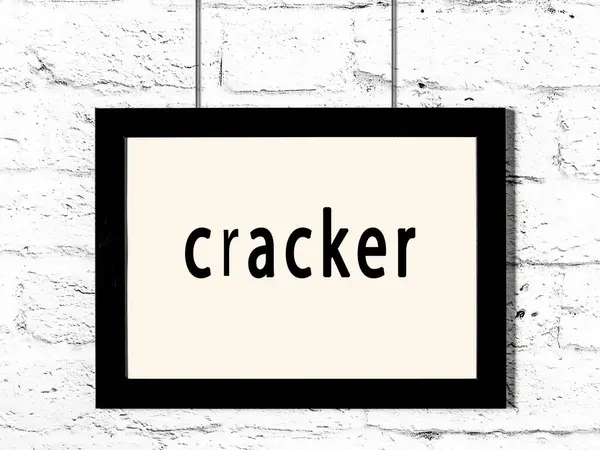 Moldura Madeira Preta Com Cracker Inscrição Pendurado Parede Tijolo Branco — Fotografia de Stock