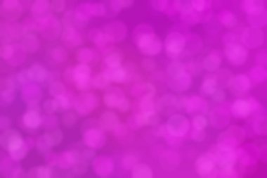 Çember şeklindeki bokeh noktalarıyla odaklanmış mor soyut arkaplan