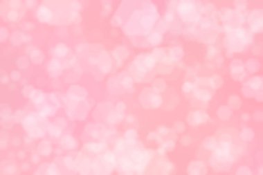Altıgen şekilli bokeh noktalı pembe soyut odaklanmış arkaplan
