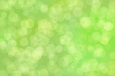 Çember şekilli bokeh benekli yeşil soyut odaklanmış arkaplan