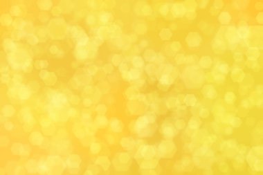 turuncu soyut odaklanmış arkaplan altıgen şekilli bokeh benekleri ile