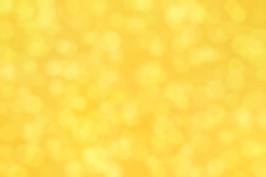 Sıcak turuncu ve altın rengi olan soyut bokeh arkaplan