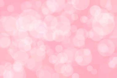 Çember şeklindeki bokeh benekleri ile odaklanmış pembe soyut arkaplan