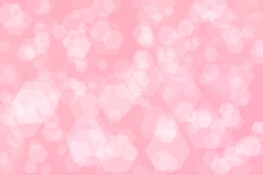 Altıgen şekilli bokeh noktalı pembe soyut odaklanmış arkaplan