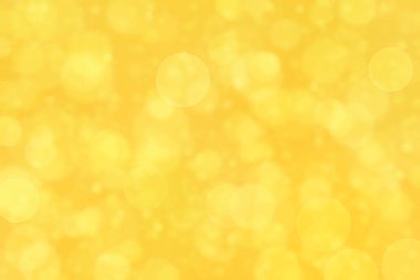 Sıcak turuncu ve altın rengi olan soyut bokeh arkaplan