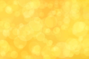 Çember şekilli bokeh benekli turuncu soyut odaklanmış arkaplan