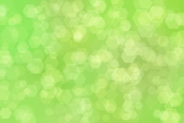 Altıgen şekilli bokeh benekli yeşil soyut odaklanmış arkaplan