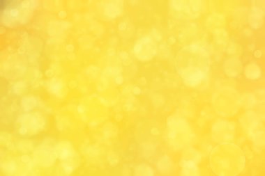 Sıcak turuncu ve altın rengi olan soyut bokeh arkaplan