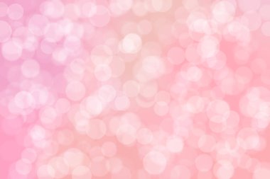 Çember şeklindeki bokeh benekleri ile odaklanmış pembe soyut arkaplan