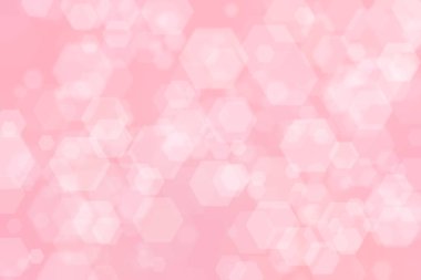 Altıgen şekilli bokeh noktalı pembe soyut odaklanmış arkaplan