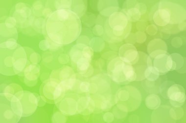 Çember şekilli bokeh benekli yeşil soyut odaklanmış arkaplan