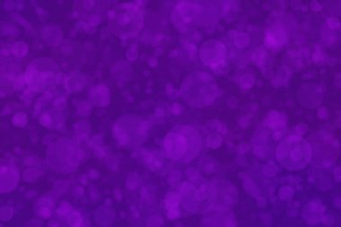 Bokeh ile soyut bir arkaplan. Yumuşak ışık odaklı noktalar.