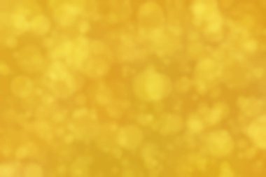 Çember şeklindeki bokeh noktalarıyla odaklanmış altın soyut arkaplan