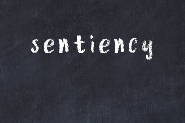 Tebeşir elle yazılmış yazı hassasiyeti siyah masada.