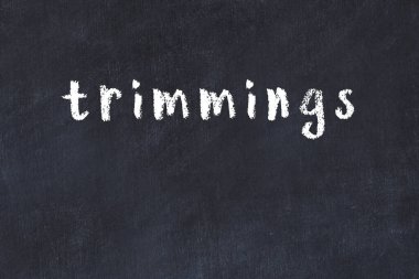 Üzerinde el yazısı süslemeleri olan üniversite yazı tahtası.