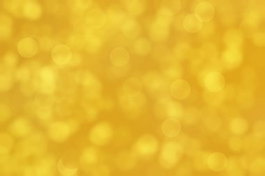 Fortuna altın rengi soyut odaklanmış bokeh arkaplanı. 