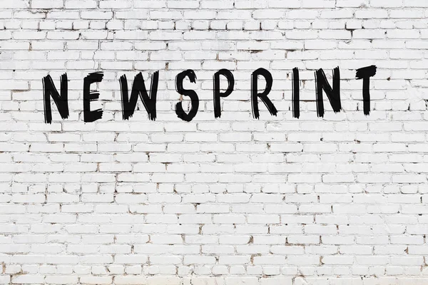 White Brick Wall Inscription Newsprint Handwritten Black Paint — Stock Photo, Image