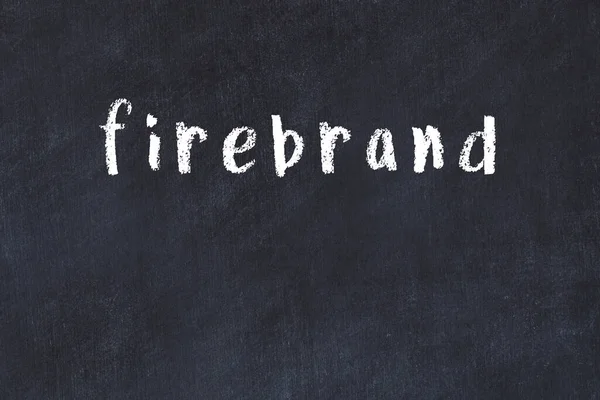 Kreide Handschriftliche Inschrift Firebrand Auf Schwarzem Schreibtisch — Stockfoto