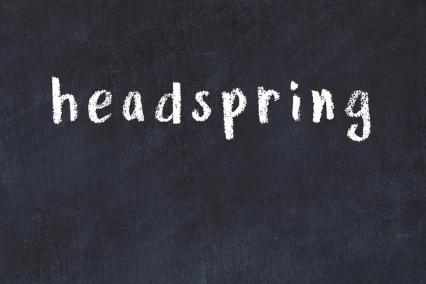 Üzerinde el yazısı yazı tahtası olan üniversite yazı tahtası.