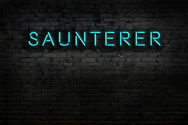 Πινακίδα Νέον Επιγραφή Saunterer Κατά Τοίχο Από Τούβλα Νυχτερινή Προβολή — Φωτογραφία Αρχείου