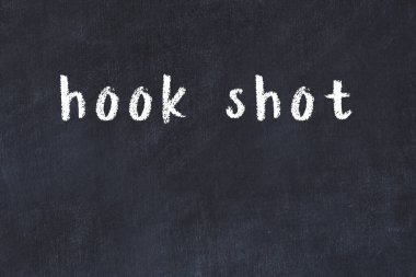 Üzerinde el yazısıyla çizilmiş kanca resmi olan üniversite tahtası.