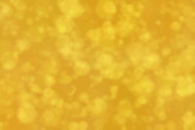 Altıgen şekilli bokeh benekleri ile odaklanmış altın soyut arkaplan