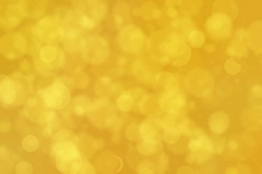 Çember şeklindeki bokeh noktalarıyla odaklanmış altın soyut arkaplan