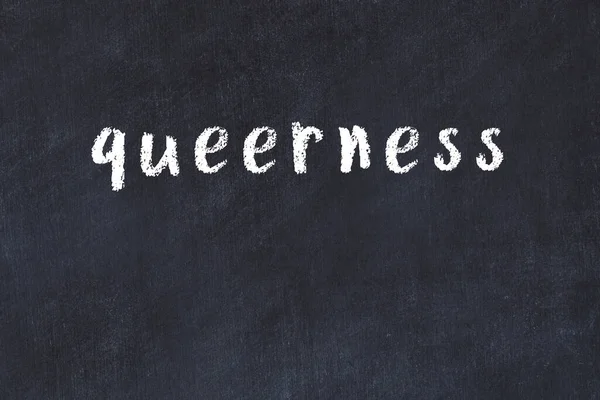 Chalk Handwritten Inscription Queerness Black Desk — Stock Photo, Image