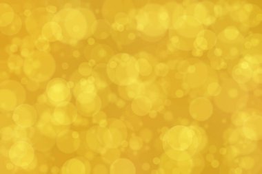 Çember şeklindeki bokeh noktalarıyla odaklanmış altın soyut arkaplan