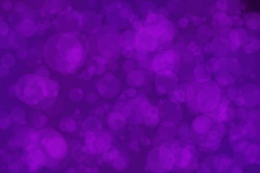 Bokeh 'te benekleri olan patlıcan renkli astrakt arkaplan.