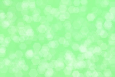 Yeşil arka planda ışık lekeleri. Soyut bokeh.