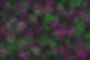 Bokeh ile soyut bir arkaplan. Yumuşak ışık odaklı noktalar.