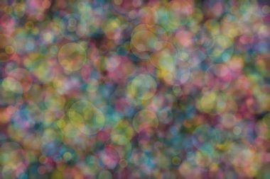 Bokeh ile soyut bir arkaplan. Yumuşak ışık odaklı noktalar.