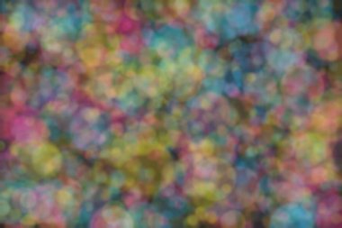 Bokeh ile soyut bir arkaplan. Yumuşak ışık odaklı noktalar.