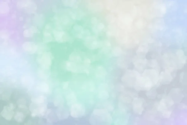 Pale pastel colored abstract background. Soft bokeh.