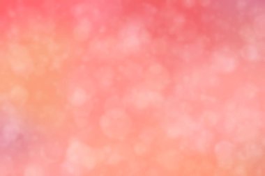 Soyut bokeh arkaplanda kırmızı mercan dairesi şekilli noktalar.