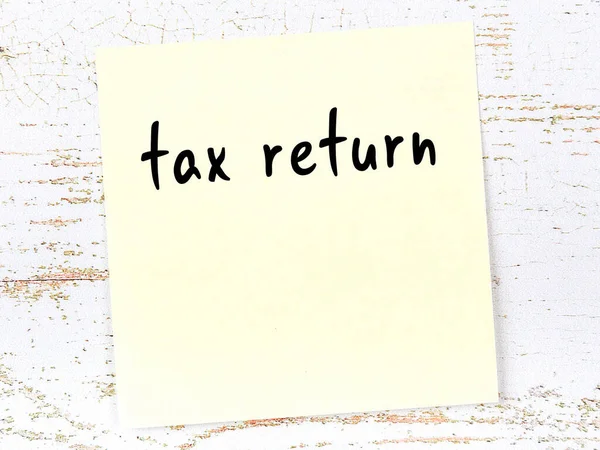 Yellow Sticky Note Wooden Wall Handwritten Inscription Tax Return — Stock Photo, Image