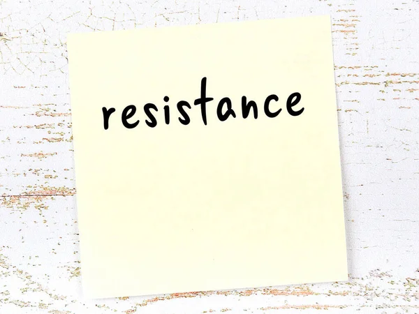 Concept Reminder Resistance Yellow Sticky Sheet Paper Wooden Wall Inscription — Stock Photo, Image