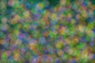 Bokeh ile soyut bir arkaplan. Yumuşak ışık odaklı noktalar.