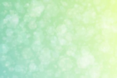 Bokeh ile soyut bir arkaplan. Yumuşak ışık odaklı noktalar.