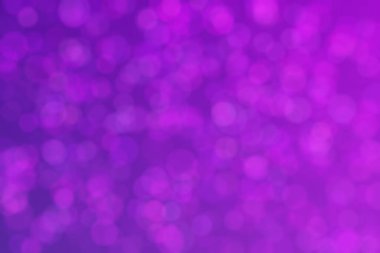 Bokeh ile soyut bir arkaplan. Yumuşak ışık odaklı noktalar.