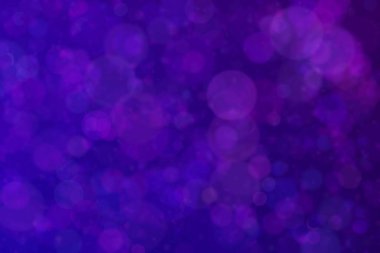 Bokeh ile soyut bir arkaplan. Yumuşak ışık odaklı noktalar.