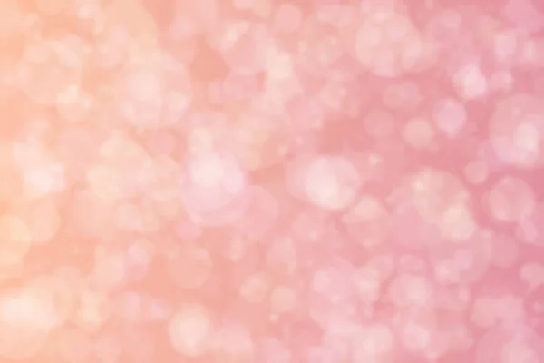 Pink romantic background with bokeh defocused sparkling lights