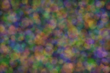 Bokeh ile soyut bir arkaplan. Yumuşak ışık odaklı noktalar.