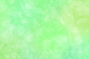 Yeşil arka planda ışık lekeleri. Soyut bokeh.