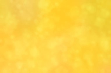 Sıcak turuncu ve altın rengi olan soyut bokeh arkaplan