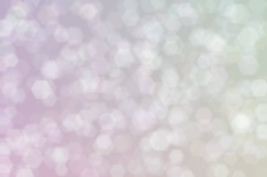 altıgen şekilli bokeh benekleri ile odaklanmış gri soyut arkaplan